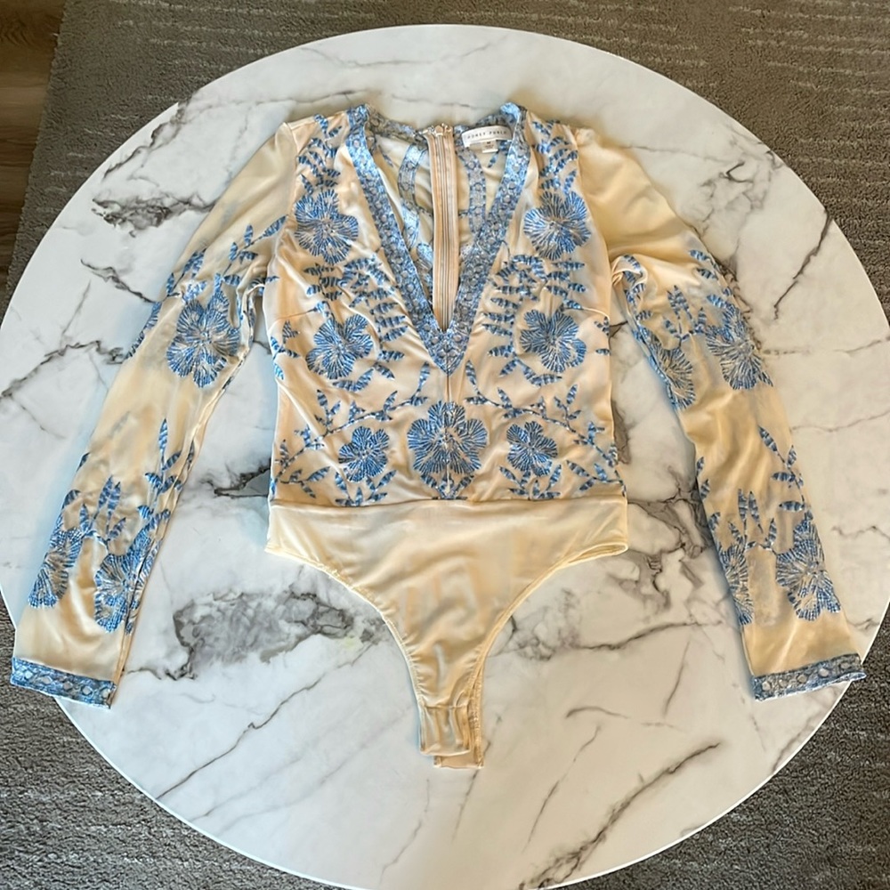 Honey Punch Nude & Blue patterned bodysuit, size medium *fits more like a small
